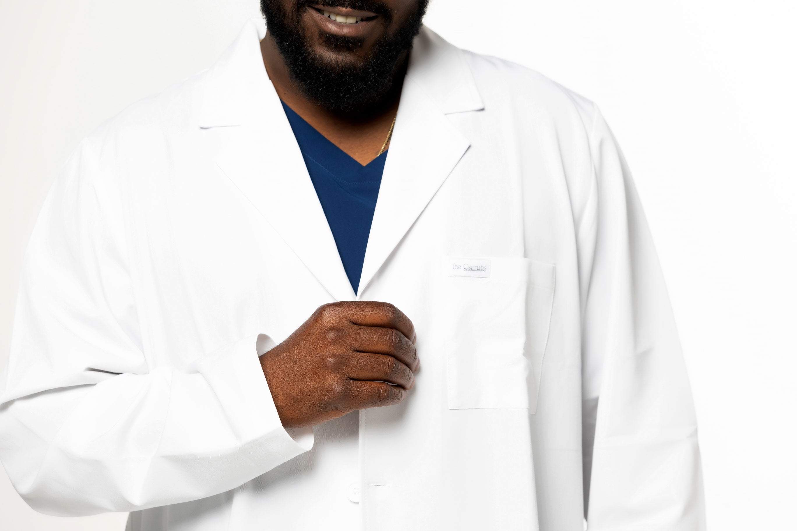 Men's lab coat, Professional attire, Medical wear, Scientific coat, Lab attire, Workwear, Tailored fit, Durable fabric, Multiple pockets, Button-front closure, Notched collar, Professionalism, Sophisticated, Functional design, Essential work garment, Comfortable wear, Professional appearance, Laboratory coat, Healthcare attire, High-quality craftsmanship